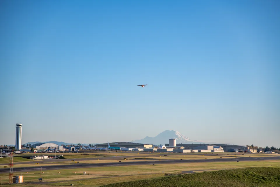 Runway and plane taking off at Paine Field, Everett, Washington